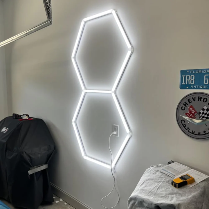 2 Hexagon LED light on white wall 