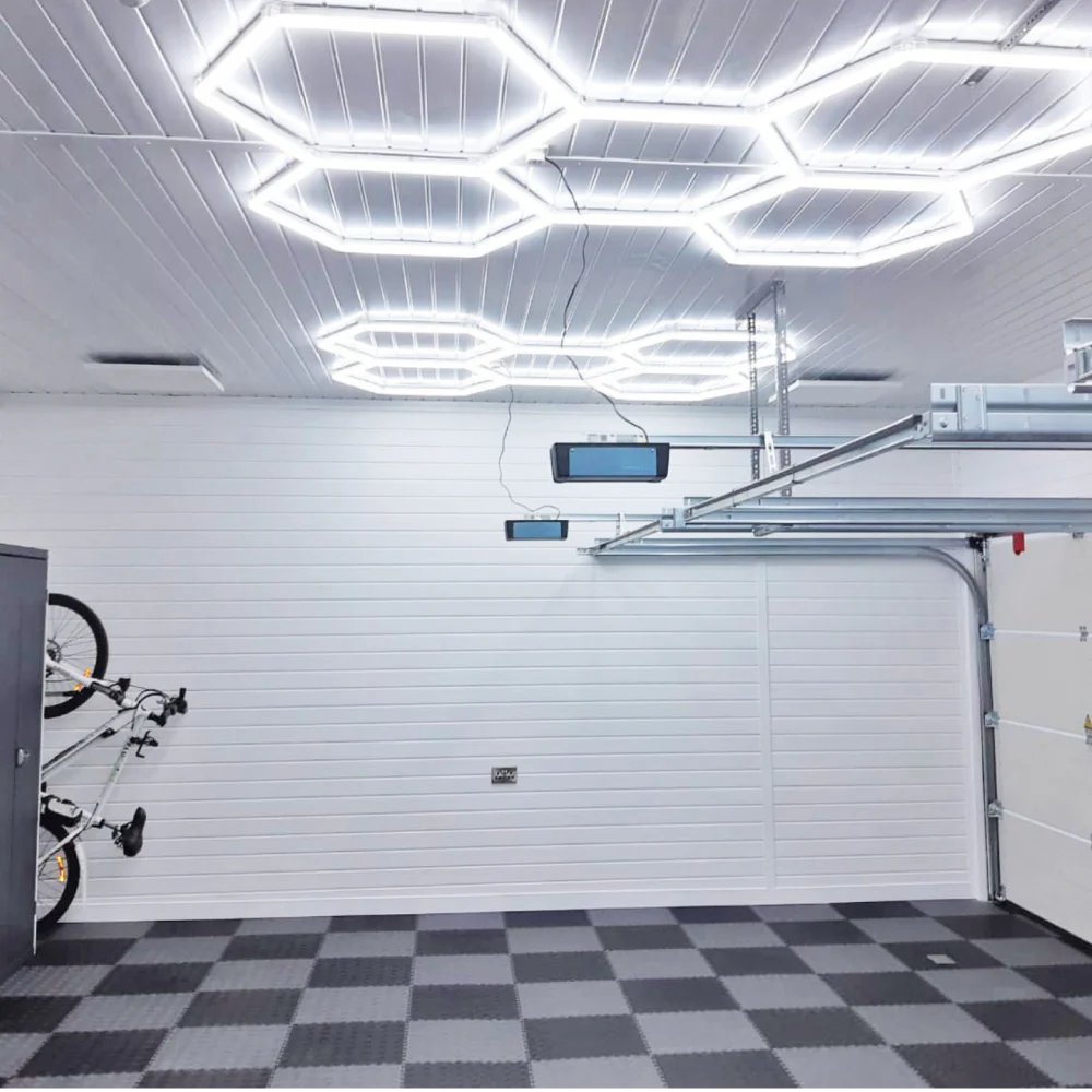 2 pack of 5 hexagonal lighting on white ceiling and wall garage 