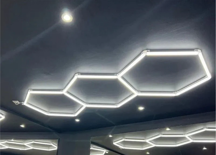 3 hexagon lighting on black ceiling