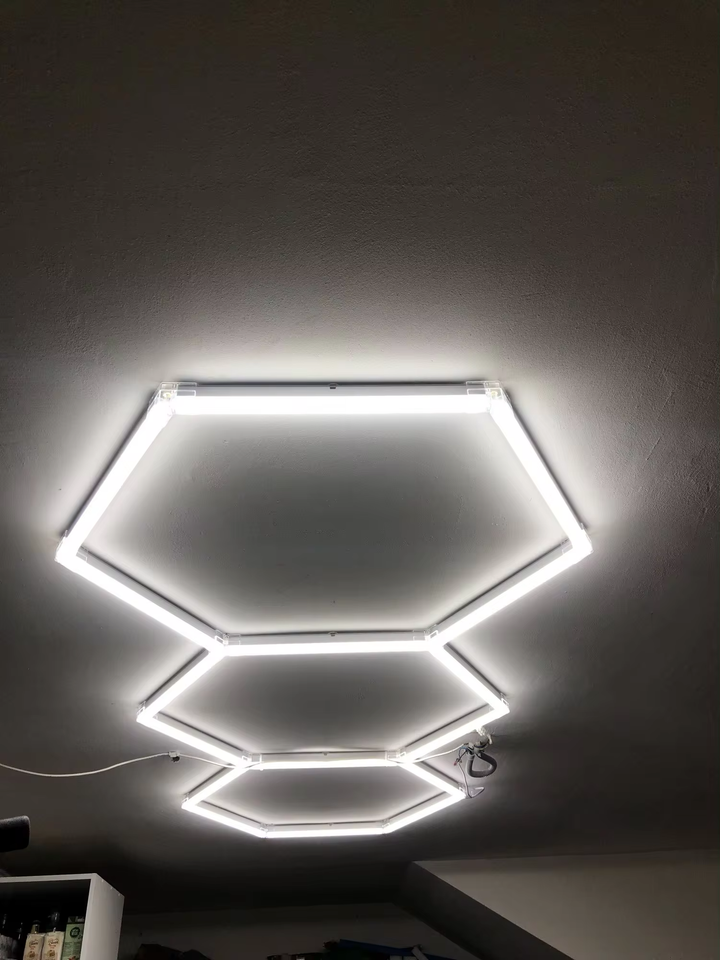 3 hex lighting on white ceiling 