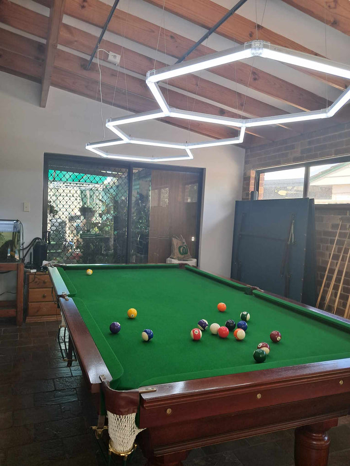 3 hexagon lights pool table area