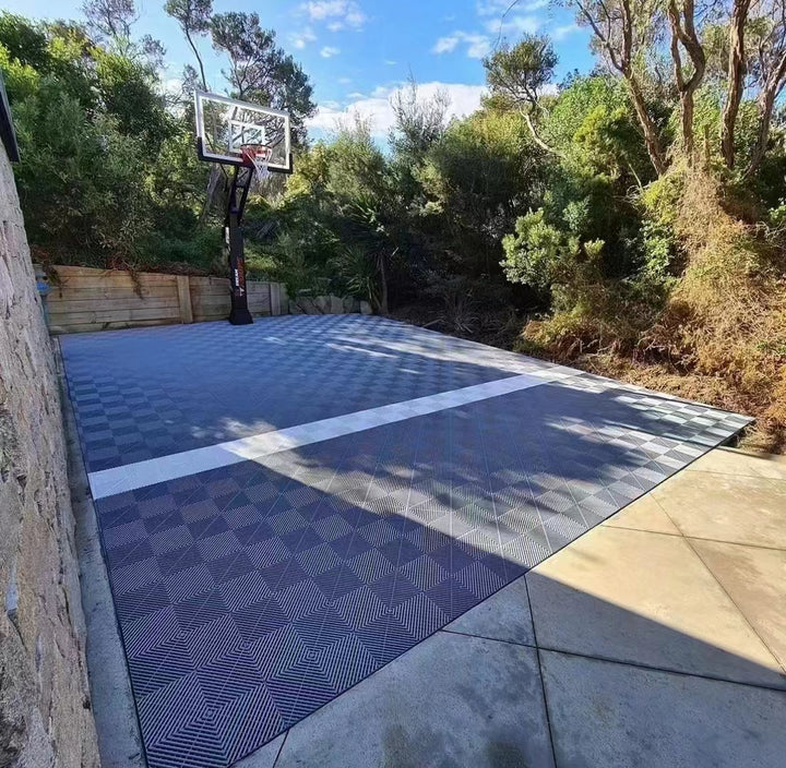 black and white flooring tiles in basketball court