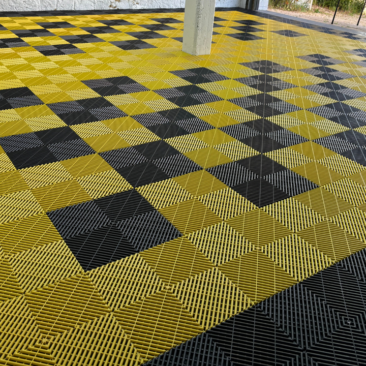 black and yellow garage floor tiles in double garage
