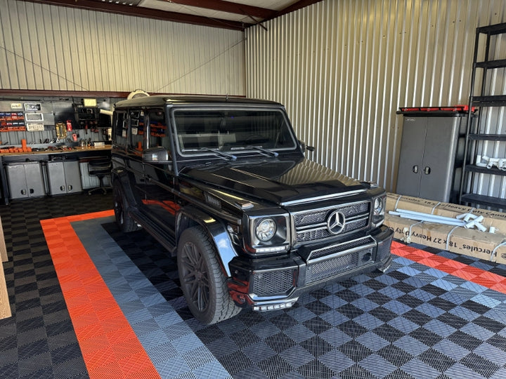 black grey and red garage tiles with g wagon