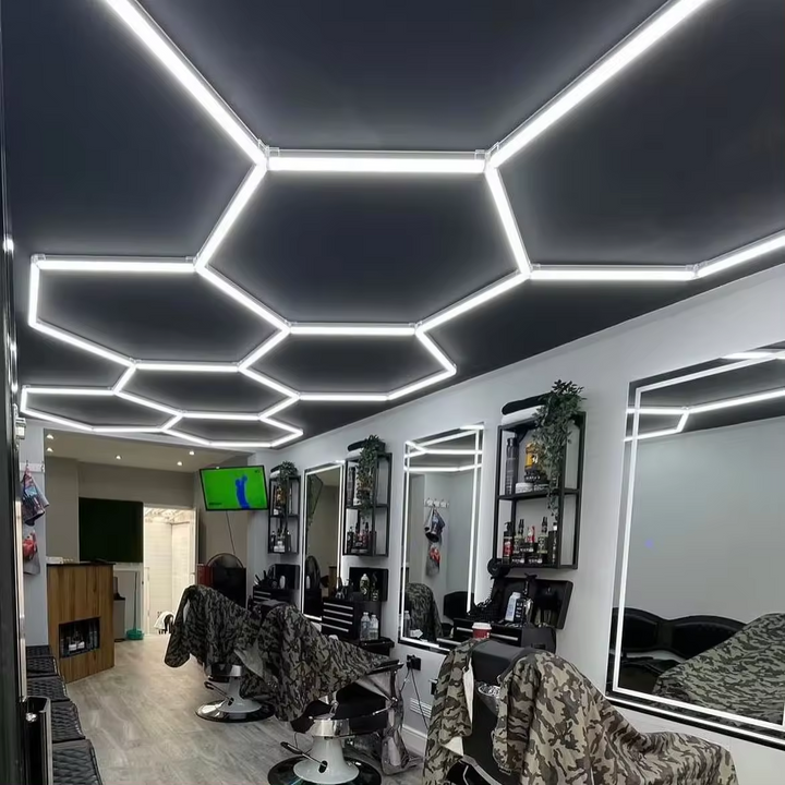 long 8 hexagon lighting system in barbershop black ceiling 